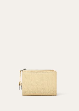 Cartera plegable con cremallera extra