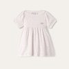 Vestido de bebé con números pequeños Vestido de bebé con números pequeños